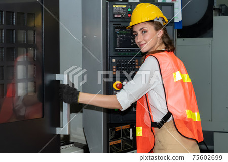 Smart factory worker or engineer do machine job in the manufacturing workshop Smart factory worker or engineer do machine job in the manufacturing workshop 75602699