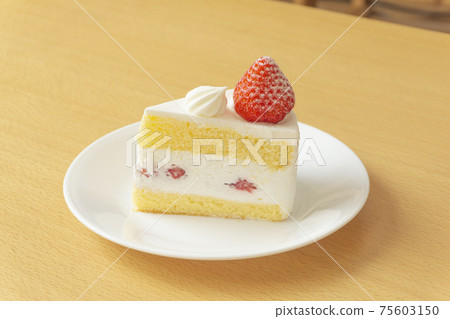 Strawberry shortcake on the table. Taken in the children's room 75603150