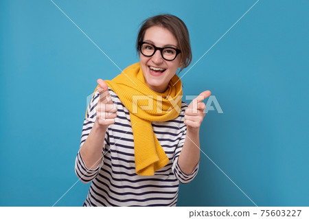 Young smiling woman pointing on you choosing as best friend. 75603227
