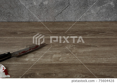 A dark room in an old house and a knife with blood A dark room in an old house and a knife with blood 75604428