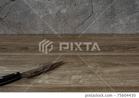 A dark room in an old house and a knife with blood 75604430