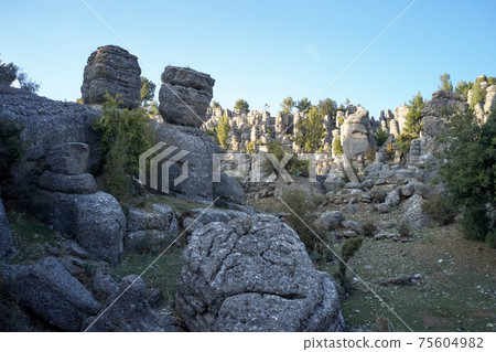 Beautiful geological formations under blue sky. 75604982