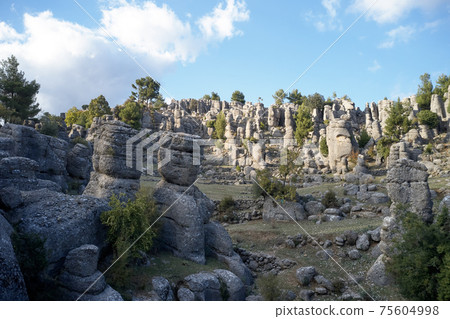 Beautiful rock formations under blue sky. 75604998