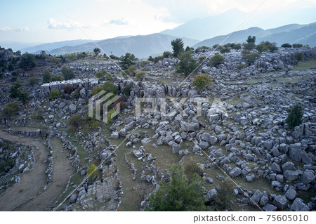 Mountain landscape with grey rocks and stones. Mountain landscape with grey rocks and stones. 75605010