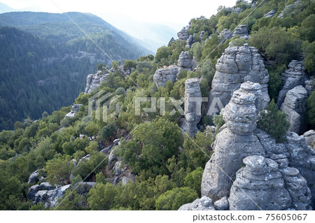 Incredible grey rock formations. National Park of Manavgat. Incredible grey rock formations. National Park of Manavgat. 75605067