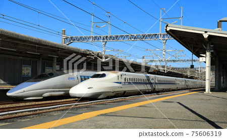 N700 Series Nozomi overtaking 500 Series Kodama (JR Higashi-Hiroshima Station, Hiroshima Prefecture, Japan) 75606319