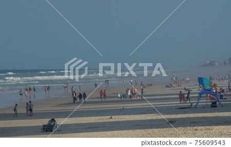 Beautiful view down New Smyrna Beach on the Atlantic Ocean in Volusia County, Florida 75609543