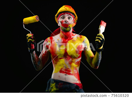 the man is a builder a painter a plasterer all in paint with a brush and a roller the man is a builder a painter a plasterer all in paint with a brush and a roller 75610320