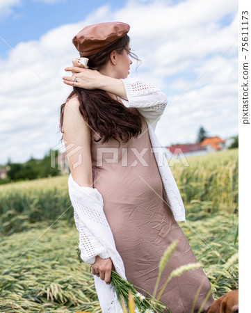 White young woman on wheat field White young woman on wheat field 75611173
