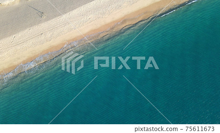 Pacific Ocean beach with crystal calm water Pacific Ocean beach with crystal calm water 75611673
