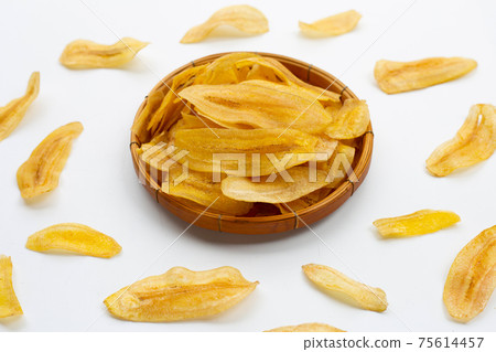 Banana slice chips on white background. Banana slice chips on white background. 75614457