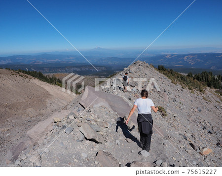 Hikers on the Timberline Trail on Mount Hood, Oregon. 75615227
