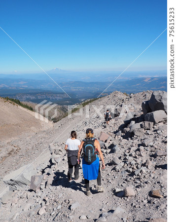 Hikers on the Timberline Trail on Mount Hood, Oregon. Hikers on the Timberline Trail on Mount Hood, Oregon. 75615233