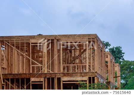 Construction home framing on residential beam framework wooden new house Construction home framing on residential beam framework wooden new house 75615640