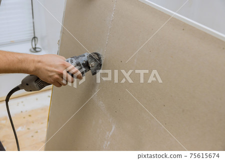 Angle hand electric power tools cut drywall sheet 75615674