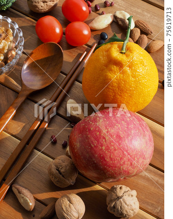 Fresh organic vegetables, fruits, nuts, spoons and chopsticks Fresh organic vegetables, fruits, nuts, spoons and chopsticks 75619713
