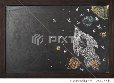 a rocket with planets is drawn on a chalk board a rocket with planets is drawn on a chalk board 75623310