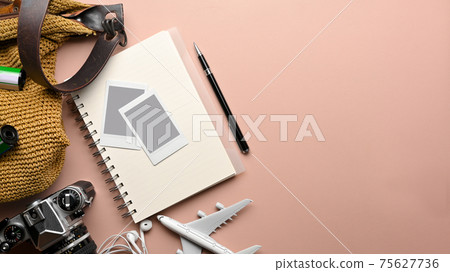 Travel concept creative mock up scene with notebook, camera, photo frame, bag and airplane model 75627736