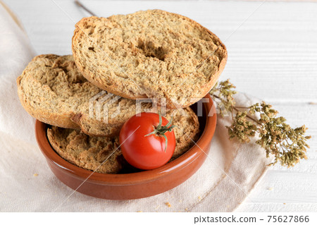 Classical apulian friselle made in Puglia, Salento by wholegrain weat Classical apulian friselle made in Puglia, Salento by wholegrain weat 75627866