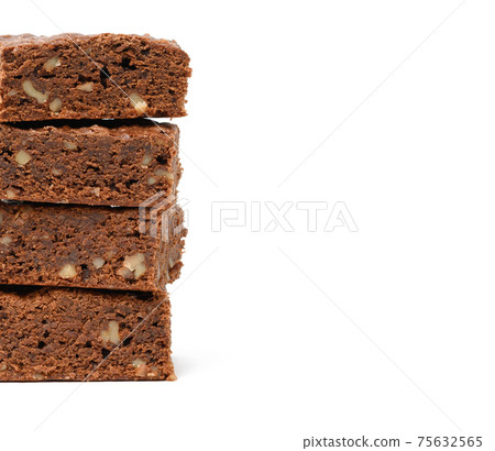 stack of baked chocolate brownie pieces with walnut isolated on white background, delicious dessert 75632565