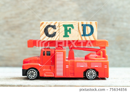 Fire ladder truck hold letter block in word CFD (Abbreviation of Contract for Difference) on wood background 75634856