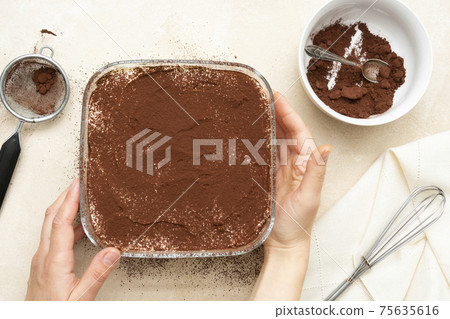 Cooking tiramisu cake with sponge fingers cookies. Step by step recipe. Top view. 75635616