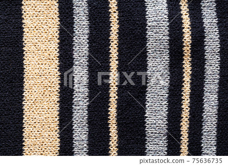 Modern clothes with black and brown stripes, background, macro. Material Modern clothes with black and brown stripes, background, macro. Material 75636735