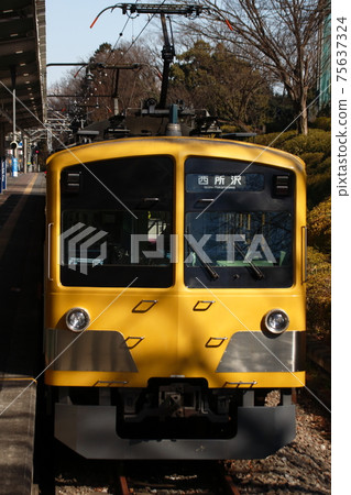 Seibu Sayama Line 101 series towing vehicle parked at Seibu Kyujo-mae Station 75637324