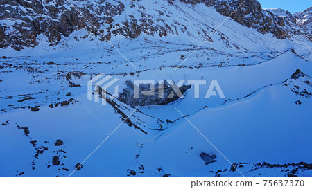 View of the snowy mountains and glacier. 75637370