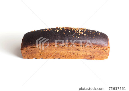 Loaf of black wheat bread with coriander seasoning on white plate, isolate. Healthy bread 75637561