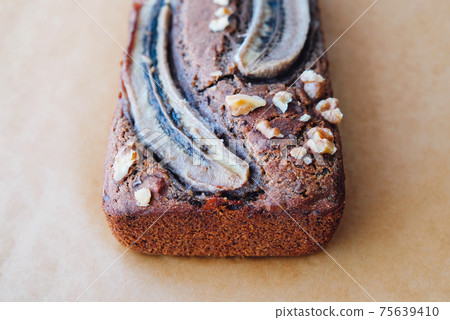 Freshly baked homemade gluten free banana bread cake. Freshly baked homemade gluten free banana bread cake. 75639410