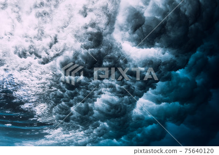 Wave underwater with foam, bubbles and sunlight. Transparent ocean in underwater Wave underwater with foam, bubbles and sunlight. Transparent ocean in underwater 75640120