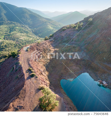 Aerial view of abandoned open pit mine Alestos, Cyprus Aerial view of abandoned open pit mine Alestos, Cyprus 75643646