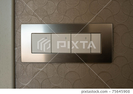 A block of four switches in a metal frame. Illumination on the switch keys. A block of four switches in a metal frame. Illumination on the switch keys. 75645908