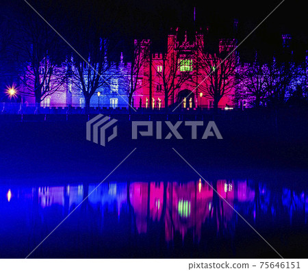 Illuminated water splash by night in Torun, Poland Illuminated water splash by night in Torun, Poland 75646151