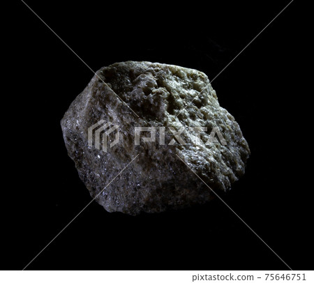 Mica and palygorskite mineral inside rock from Ural, Russia. A stone isolated on black. For geology mineralogy magazines or websites, stone collection catalog, Natural Science museum wall chart 75646751