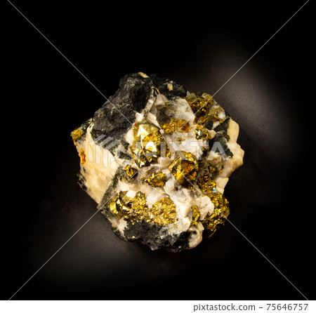 Shiny pyrite fools gold mineral from Ural, Russia. A backlight photo of a stone isolated on black. Geology websites, stone collection catalog, Natural Science museum wall chart Shiny pyrite fools gold mineral from Ural, Russia. A backlight photo of a stone isolated on black. Geology websites, stone collection catalog, Natural Science museum wall chart 75646757