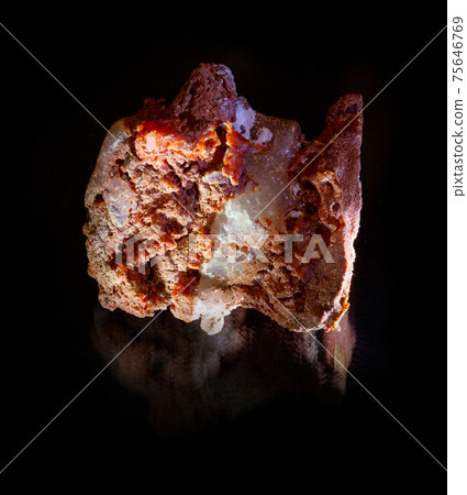 Shiny transparent white halite rock salt crystal inside red sylvinite mineral from Soligorsk, Belarus. Isolated on black. Geology mineralogy websites, stone catalog, Natural Science museum wall chart Shiny transparent white halite rock salt crystal inside red sylvinite mineral from Soligorsk, Belarus. Isolated on black. Geology mineralogy websites, stone catalog, Natural Science museum wall chart 75646769