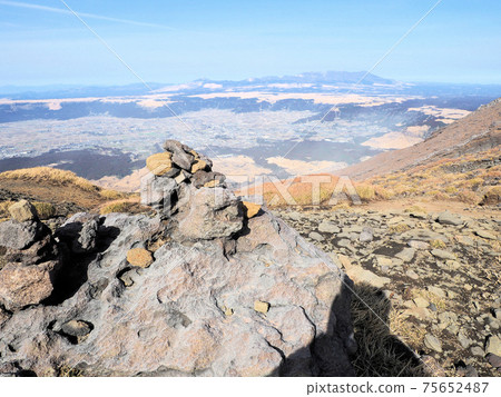 Aso valley and Kuju mountain range seen on the way from Aso Nakadake to Takaoka 75652487