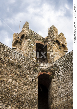 Tower and wall of the fortress Montalcino Fortezza in Montalcino, Tuscany, Italy Tower and wall of the fortress Montalcino Fortezza in Montalcino, Tuscany, Italy 75652943