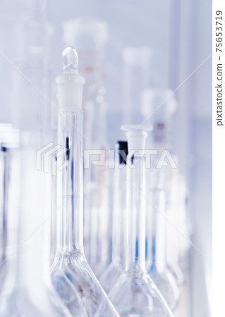 Laboratory glassware, test tubes and flasks for experiments and scientific discoveries. Laboratory glassware, test tubes and flasks for experiments and scientific discoveries. 75653719
