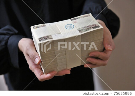 A bundle of bills A bundle of bills 75655996