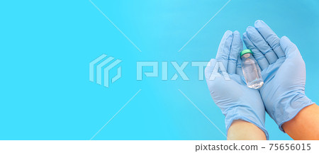 Potential trials stage concept on blue background. Close up Vials with sterile needle syringe. Research and Development, Vaccination. Potential trials stage concept on blue background. Close up Vials with sterile needle syringe. Research and Development, Vaccination. 75656015