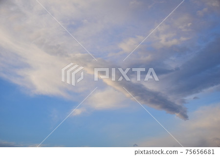 Dramatic rod-shaped cloud, madder-colored rod-shaped cloud, interestingly shaped sunrise cloud Dramatic rod-shaped cloud, madder-colored rod-shaped cloud, interestingly shaped sunrise cloud 75656681