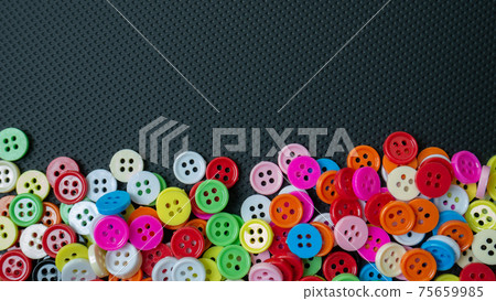 The Buttons multi colour on black background for abstract concept The Buttons multi colour on black background for abstract concept 75659985