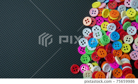 The Buttons multi colour  on black background for abstract concept 75659986