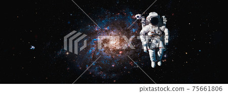Astronaut spaceman do spacewalk while working for space station 75661806