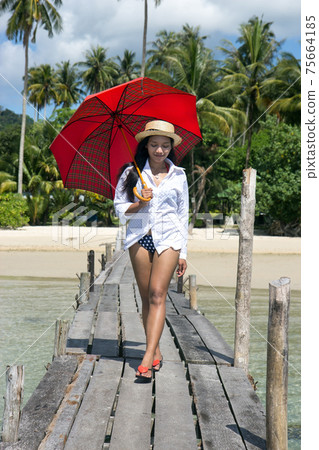 young woman with umbrella young woman with umbrella 75664185