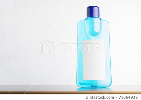 Carpet cleaning liquid bottle in front of light gray background mock-up series Carpet cleaning liquid bottle in front of light gray background mock-up series 75664939