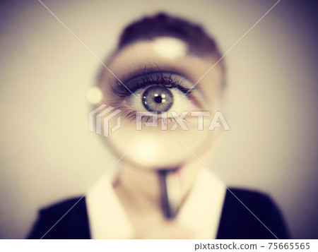 Funny woman office working secretary with magnifier 75665565